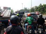 perusahaan-jasa-ojek-berbasis-aplikasi-mobile-gojek_20150710_160948.jpg