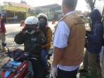 psbb-di-kota-bandung-pemotor-yang-boncengan-dihentikan.jpg