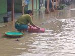 situasi-banjir-yang-menggenangi-rumah-warga-di-blok-cikamangi.jpg