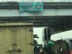 spanduk-tb-simatupang.jpg