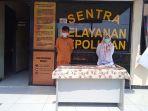 suami-istri-rampok-taksi-online.jpg