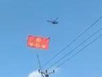 tangkapan-layar-helikopter-yang-dinarasikan-terbang-membawa-bendera-cina-tangkapan-layar.jpg