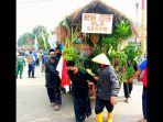 tradisi-guar-bumi-yang-diselenggarakan-oleh-desa-weragati.jpg