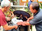 warga-kayuambon-uji-coba-mesin-pembakar-sampah.jpg