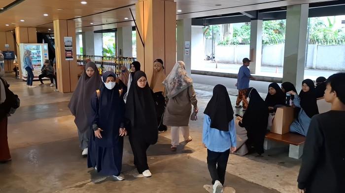LIBUR LEBARAN DI TIM - Warga mengisi waktu libur Lebaran dengan menikmati pertunjukan bintang Planetarium di Taman Ismail Marzuki, Jakarta, Kamis (26/3/2026).