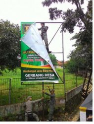 Bertebaran Tidak Teratur, Satpol PP Mulai Copot Alat Peraga Kampanye di Depok