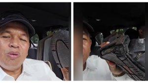 Dedi-Mulyadi-memperlihatkan-sepatunya-patah.jpg