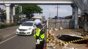 Lubang-di-Jalan-Daan-Mogot-Senin-1332023.jpg