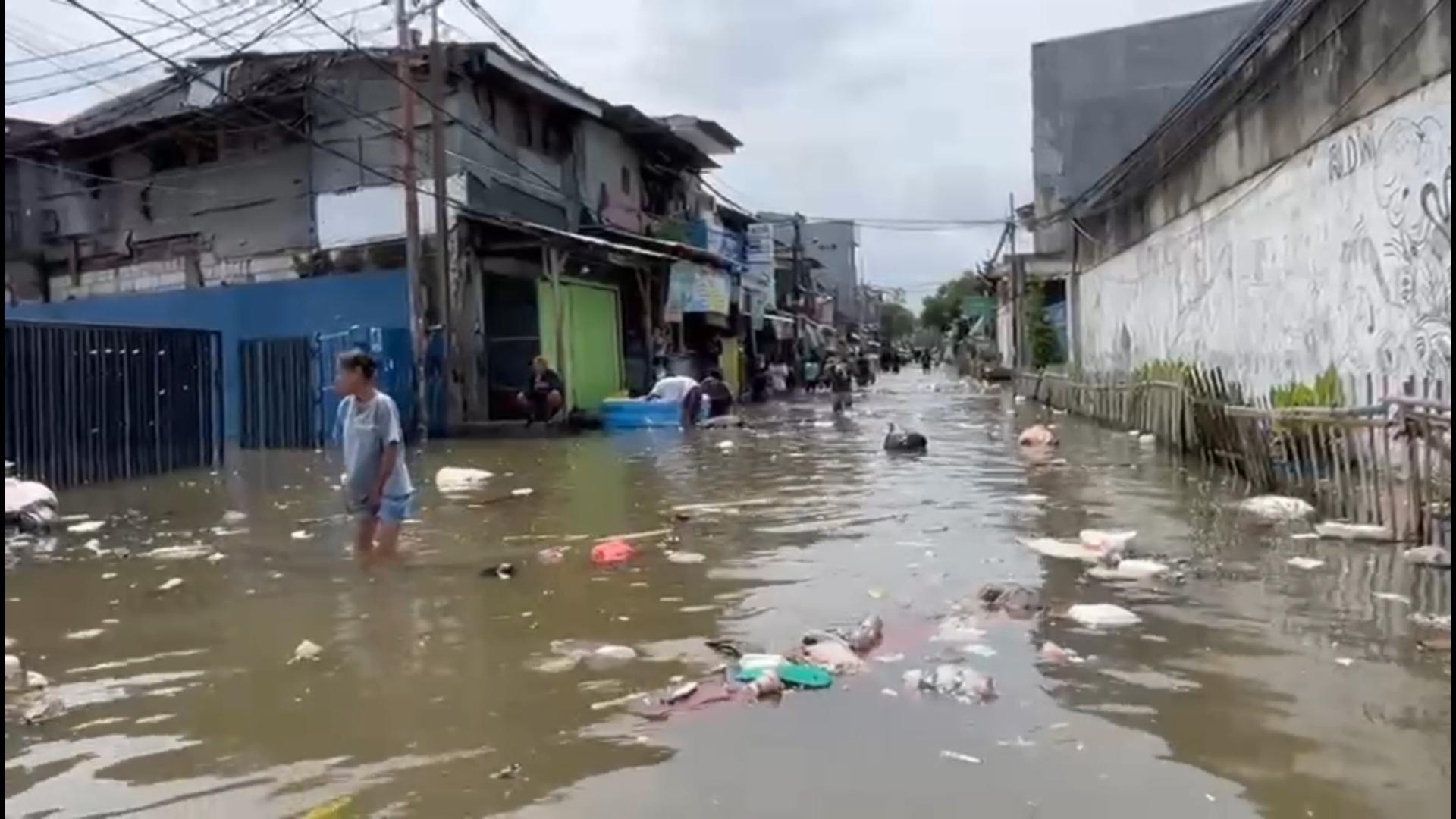 Banjir-yang-merendam-permukiman-warga-di-Kapuk-Muara.jpg