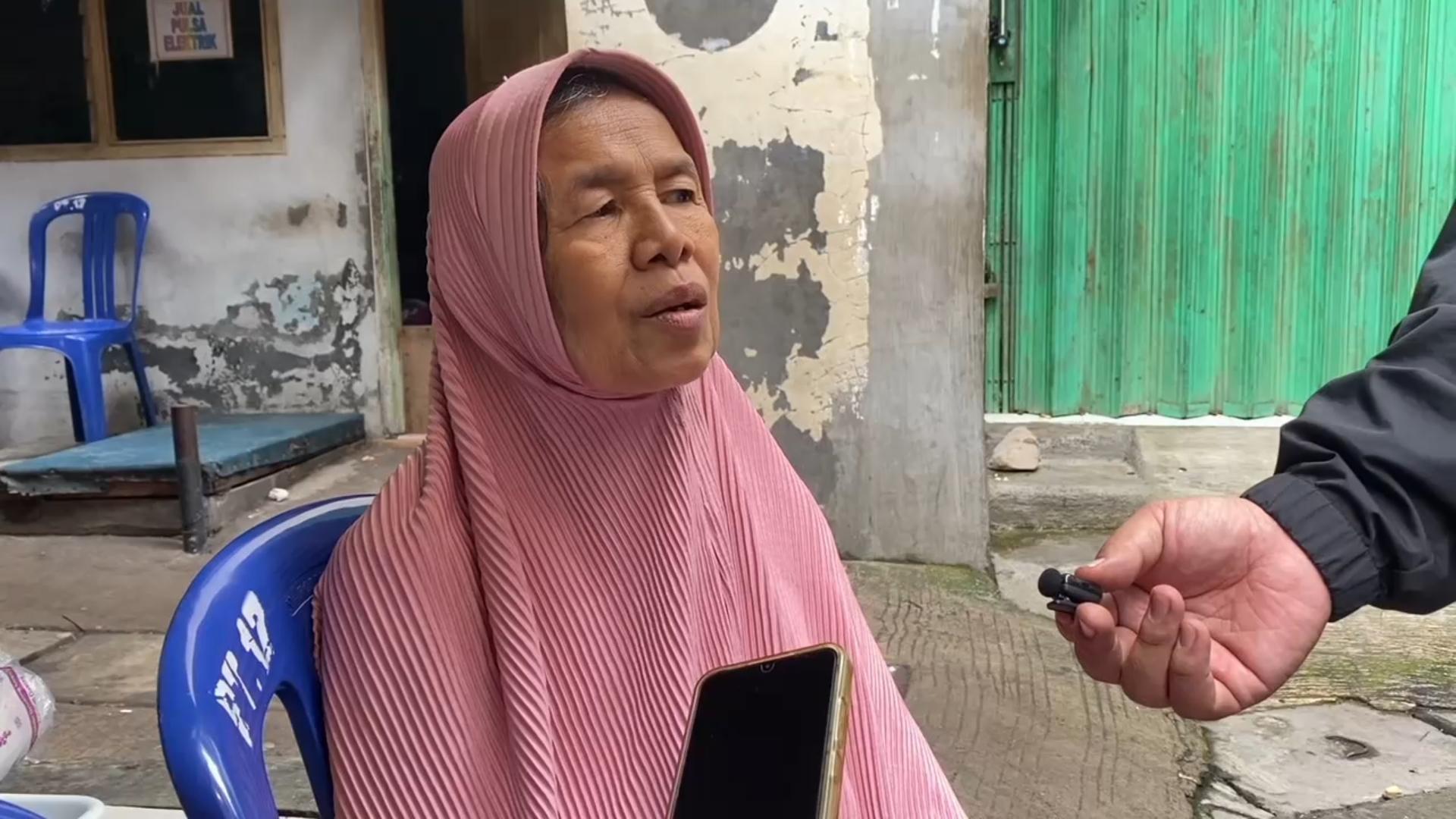 PILU-KORBAN-BANJIR-Siti-Nafsiah-ibu-dari-almarhum-Rohim.jpg