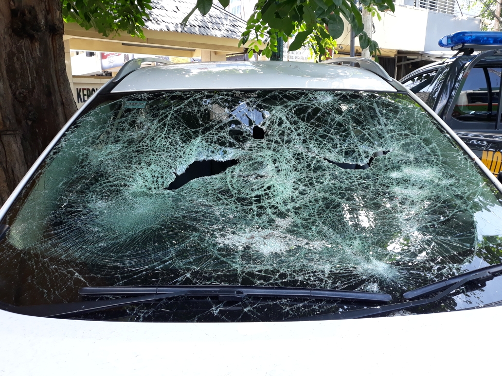 Polisi Minta Driver Ojek Online Tersangka Pengrusakan Mobil Serahkan Diri
