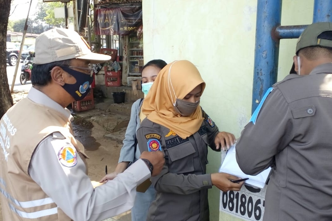 kegiatan-penertiban-masyarakat-yang-tak-mengenakan-masker-di-kota-depok.jpg