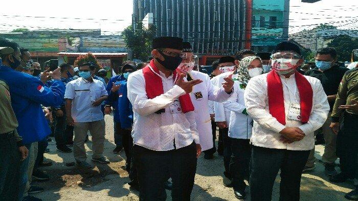 pasangan-mohammad-idris-imam-budi-hartono-mendaftar-ke-kpu-kota-depok-minggu-692020.jpg
