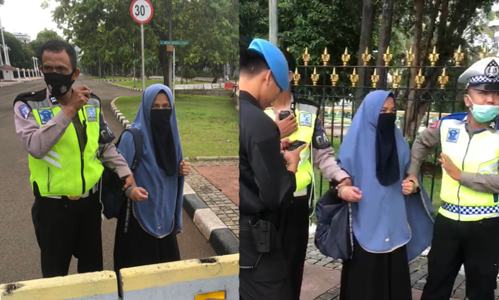 seorang-wanita-tibat-tiba-mengacukan-pistol-ke.jpg