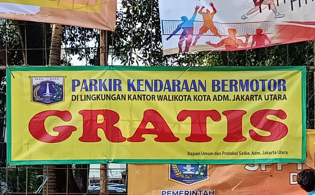 spanduk-pemberitahuan-parkir-kendaraan-bermotor.jpg
