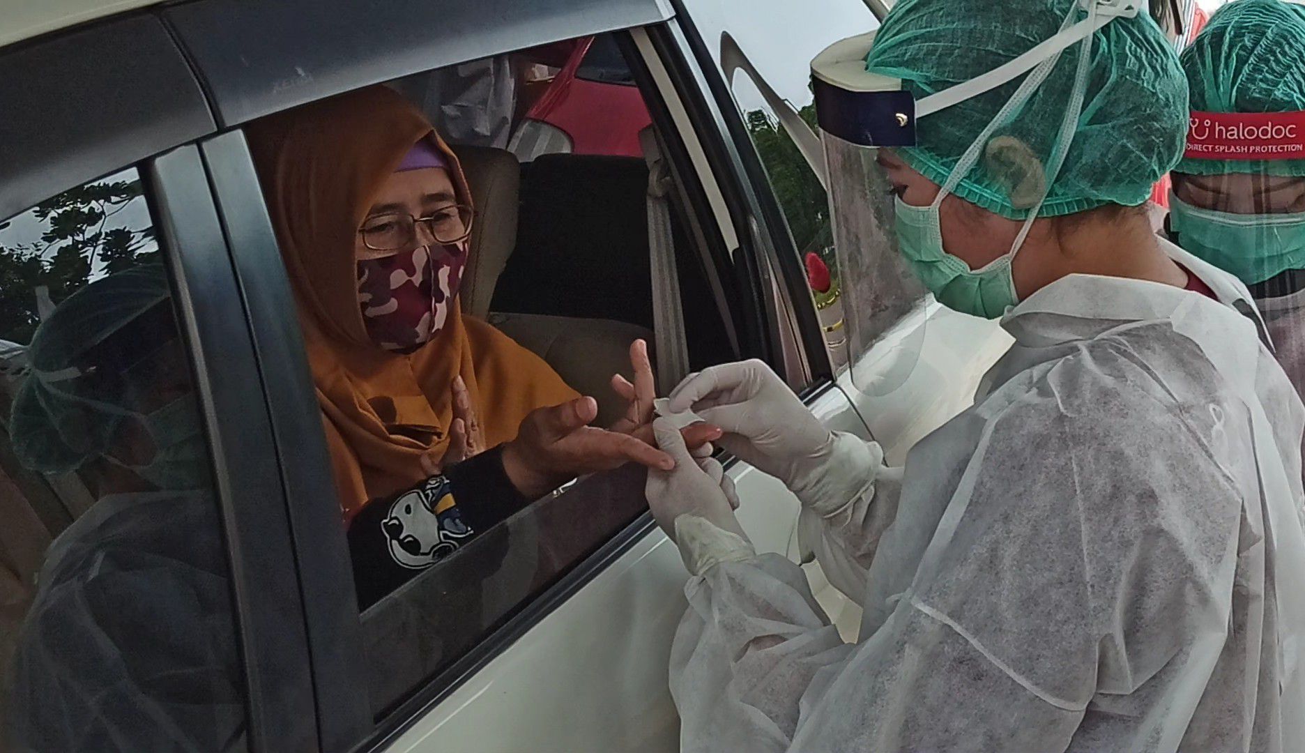Begini Langkah-langkah Rapid Test Covid-19 Secara Drive Thru yang Diadakan Halodoc di Kemayoran