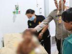 Kapolres-Simalungun-membawa-bocah-5-tahun-yang-mendapat.jpg