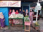 Kegiatan-Jumat-Berkah-pembagian-bahan-pangan-gratis-yang-dilakukan-Kelompok-Wanita-Tani.jpg