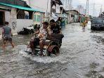 Kondisi-banjir-rob-di-Muara-Angke-Penjaringan-Jakarta-Utara-Jumat-13122024.jpg
