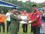 MURI-atas-Pengibaran-Bendera-Merah-Putih-Serentak-dengan-Paramotor-Terbanyak.jpg