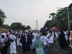 Massa-aksi-damai-bela-Palestina-mulai-berdatangan-di-Monas-Minggu-5112023.jpg