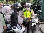 Pengendara-motor-terjaring-Operasi-Patuh-Jaya-2023-di-Jalan-Pulo-Raya-I-1.jpg