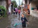 Permukiman-warga-RW-02-Kelurahan-Tengah-yang-terdampak-banjir-luapan-Kali-Induk.jpg
