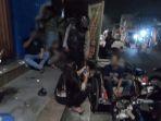 Polisi-membubarkan-warga-pasutri-yang-sedang-mabuk-mabukan-miras-jabir-di-Kalibaru-Cilincing.jpg