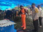 Proses-penyemprotan-disinfektan-di-tempat-penjualan-hewan.jpg
