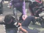 Video-yang-merekam-seorang-wanita-dibanting-atau-di-smackdown-oleh-pria-diduga-sebagai-kekasihnya.jpg