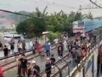 Viral-aksi-tawuran-dua-kelompok-remaja-di-rel-kereta-api-di-wilayah-Tanjung-Priok-2.jpg