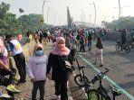 aktivitas-warga-saat-car-free-day-cfd-di-jalan-jenderal-ahmad-yani-bekasi.jpg
