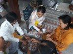 bungkus-nasi-tawur.jpg<pf>seorang-umat.jpg<pf>sejumlah-umat.jpg<pf>umat-hindu-sembahyang.jpg<pf>rombongan-umat.jpg