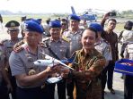 dirut-pt-dirgantara-indonesia-elfien-goentoro-dan-kabaharkam-polri-komjen-moechgiyarto_20180907_104408.jpg