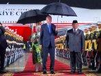 erdogan-dan-prabowo-pakai-payung.jpg