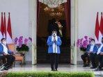 jaket-biru-menteri.jpg
