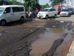 jalan-kh-noer-ali-rusak.jpg