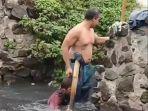 maling-kotak-amal-kiri-menceburkan-diri-ke-kali.jpg