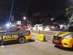 mobil-polisi-tutup-jalan-anggota-tni-ditembak.jpg
