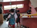 murid-korban-banjir-sdn-bidara-cina.jpg