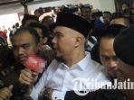 musisi-dan-politikus-ahmad-dhani-prasetya-adp-saat-menjalani-sidang-kedua.jpg