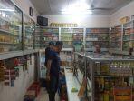 olisi-saat-menyita-barang-bukti-miras-hasil-operasi-di-bekasi.jpg