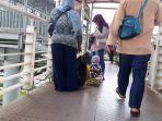 pedagang-tisu-ucok-kembali-menggelar-lapaknya.jpg