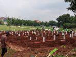 pemakaman-jenazah-dengan-protap-covid-19-di-tpu-bambu-apus-cipayung.jpg
