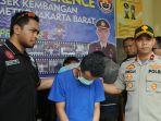 pemuda-yang-mengancam-petugas-dishub-di-polsek-kembangan.jpg