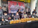 polres-tangerang-selatan-merilis-kasus-peredaran-32-kilogram-ganja-dengan-tiga-tersangka.jpg