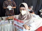 siti-nur-azizah-di-tps-08-kelurahan-pondok-pucung.jpg