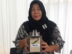 siti-rodiah-pembuat-kue-sagon-betawi_20181002_114445.jpg