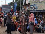 suasana-penumpukan-penumpang-pemudik-di-agen-po-bus-bulak-kapal-bekasi.jpg