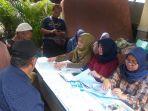 sudin-dukcapil-jaksel-melayani-warga-dokumen-akibat-banjir-sabtu-412020.jpg